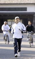 Crown Prince Naruhito jogs around the Imperial Palace