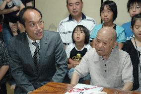 Miyazaki gov. congratulates Tomoji Tanabe as world's oldest man