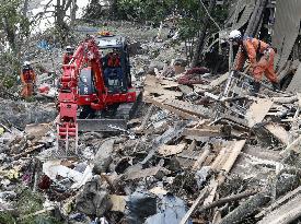 Search for missing persons continues in typhoon-hit areas