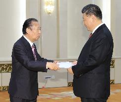 LDP senior official Nikai in Beijing