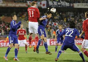 Japan overpower Denmark to cruise into last 16