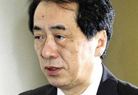 Prime Minister-elect Kan to retain most ministers