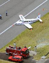 Small plane belly-lands at island airport in Tokyo, no one hurt