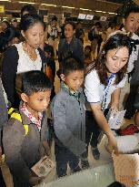 Myanmar refugees depart for Japan