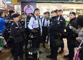 Protesters clash with police in H.K. over clearing of hawkers