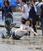 Muddy sports event in Japan