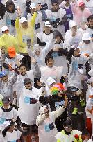 First Tokyo Marathon held in rain