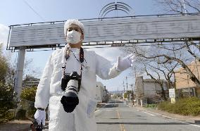 Fukushima town remains empty, but nuclear slogan disappears