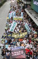 Thousands march in Hong Kong over booksellers' disappearance