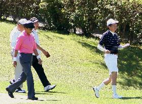 Japan PM Abe plays golf with finance minister