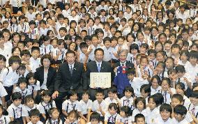 Okada given award by Osaka City