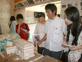 Students operate reference center for wartime underground shelte