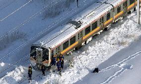 Train stranded by heavy snowfall in Japan