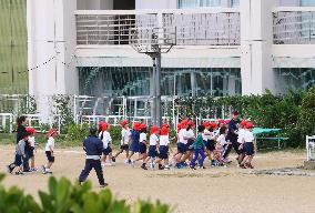 Evacuation drill at Okinawa school