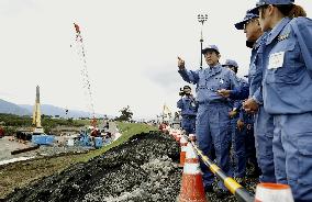 Japan PM Abe visits typhoon-affected area