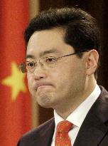 (2) China defends security steps, calls violence 'overreaction'