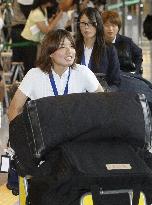 'Nadeshiko Japan' return home after victory
