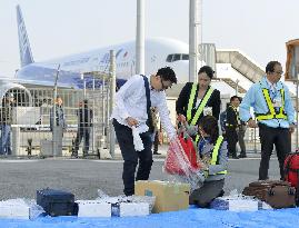 Quake-hit airport reopens to commercial flights