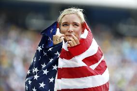 Olympic scenes: Bronze medalist wrapped with flag