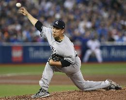 Baseball: Tanaka gets no-decision in Yankees' win over Jays