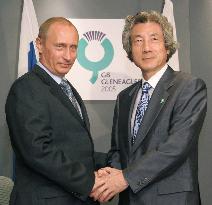 Koizumi, Putin agree on Putin's visit to Japan Nov. 20-22