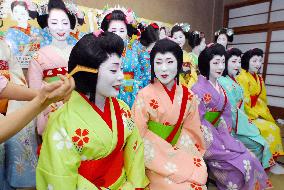 Maiko, geisha dancers wear new kimono for spring dancing event