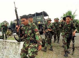 Indonesian soldiers deployed near guerrilla-controlled area