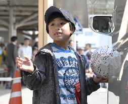 Japanese boy who survived alone in forest leaves hospital