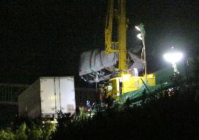 High school girl, driver dead as truck rams into bus on highway
