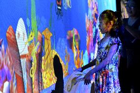 Digital art exposition attracts Chinese people