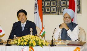 Abe, Singh adopt road map for ties, differ on climate, nukes