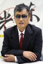 Activist Chen attends interview in Tokyo