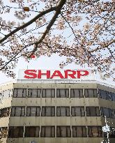Sharp approves Hon Hai's reduced takeover offer after delay