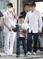 Japanese boy who survived alone in forest leaves hospital