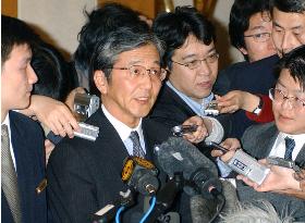 Yabunaka talks to reporters