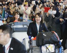 Olympics: Japanese athletes return home