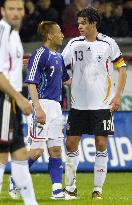 Japan hold World Cup hosts Germany to 2-2 draw