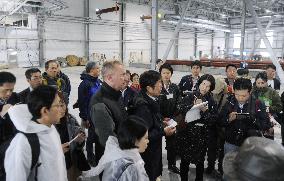 Japanese visitors to Russian-held islands