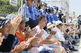 Protesters welcome new antibase Okinawa governor