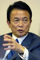Foreigns Minister Aso eyes Japan-China summit before APEC