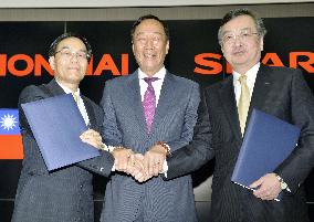 Hon Hai, Sharp sign takeover deal after month-long review