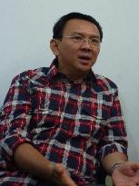 Jakarta governor vows to press on despite possible hit to popularity