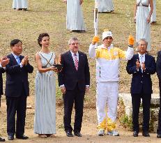 Olympic flame lit, to travel to S. Korea for Pyeongchang Games
