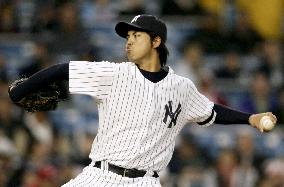 Igawa gets 1st major league win