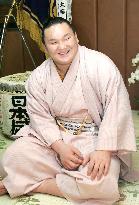 Hakuho speaks to reporters after winning summer sumo tournament