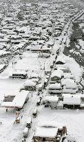 Over 300 cars stuck in snow in western Japan