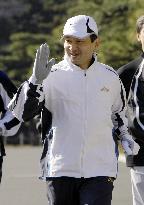 Crown Prince Naruhito jogs around the Imperial Palace