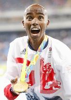 Olympics: Farah wins men's 10,000