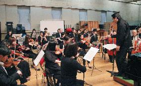 Orchestra formed by music instrument shop to hold 1st concert