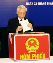 Vietnam's top leader casts ballot in parliamentary elections